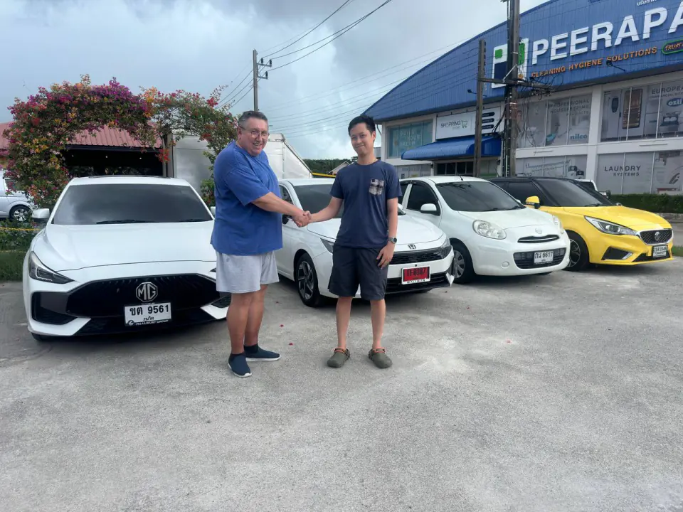 The Car Phuket Rental team beside the cars in Phuket